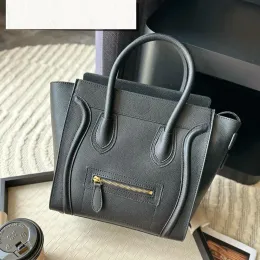 Tote leende ansiktsdesigner crossbody hanterar nya mode kvinnor läder väska toppkvalitet axel rem pochette