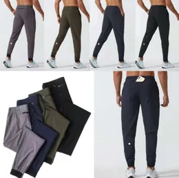 Lu Womens Ll Erkekler Jogger Uzun Pantolon Spor Yoga Kıyafet Hızlı Kuru Drawstring Spor Salonu Cepleri Sweetpants Pantolonlar Erkekler Sıradan Elastik Bel