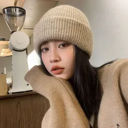 Jesienna i zimowa wełniana trend Korean ciepły ochrona ucha dla dzieci zimny pullover kapelusz stały kolor wszechstronny pokaz twarzy