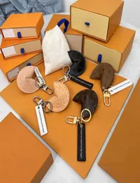 مفاتيح حبل الحبل مع Box Fortune Cookie Bag Hanging Keychain Car Flower Charm Glowerry Women Men Gifts Fashion Pu Leather Key Chain Motion Design 8865yy