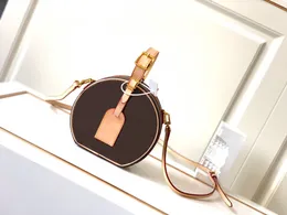 2024 A fashionable round crossbody bag with contrasting stitching and gold accessories, creating a fashionable and versatile accessory 43514