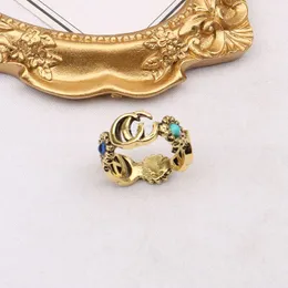 kkTop-Qualidade 18K banhado a ouro marca carta anéis de banda para homens mulheres designer de moda letras de marca turquesa cristal metal margarida anel jóias tamanho único