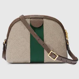 Mode axelväska utomhus crossbody klassisk brev tryckt skal stil design kvinnor väska