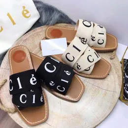 Sandálias de designers da moda Cork Bottoms Flat Mothals Summer os mais populares chinelos de femininos clássicos de praia