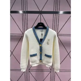 2023 Early Autumn New denim blue color matching loose and versatile temperament V-neck brooch short jacket knitted top for women