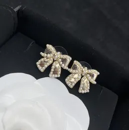 Luxusmarke Frauen Ohrstecker Designer Mode Bowknot Ohrringe Schmuck Metall Perle Anhänger Ohrringe Hohe Qualität Frauen Schmuck Ohrringe Zubehör