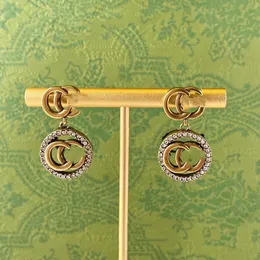 Marka projektantka Letter Double G Logo Stud Emering Luksusowe kobiety modne biżuteria metal ggity kryształ perłowy cjeeweler orecchini kjweui