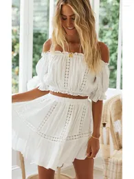 Arbetsklänningar Lucygirl Summer Women Boho Two Piece Set Casual Beach kjolar kostym spetsar från axelskördetoppar och kort veckad kjol