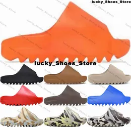 Ayakkabılar Yzys Slayt terlik sandal boyutu 14 kanyes erkek tasarımcısı Us 14 West Slaytlar Eur 48 Eur 48 Kadın Us 12 Yüksek kaliteli US14 Athletic Onyx Kamuflaj 6981 Gündelik Enflame