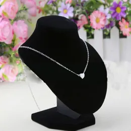 Smycken påsar halsband choker mannequin display hyllhängen står rack svart sammet hållare stent