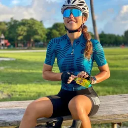 サイクリングシャツのトップアッカケルアングロカレイドスコープサイクリングジャージーチームレーシング服女性自転車ライディングシャツカラフルな半袖ウェア231109