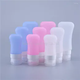 収納ボトル100pcs 37ml 60ml 89mlトラベルパッキングシリコンプレスセットローションシャンプーバスコンテナエッセンシャルオイル化粧品ボトル