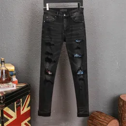 Męskie dżinsowe spodnie Projektowanie Czarne chude naklejki lekkie zrydane motocykl rockowy przebudzenie joggery prawdziwe religie Men28-40