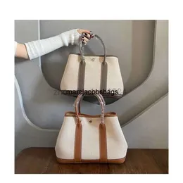 Bolsa de festas de jardim Birkinbag Luxuris bolsas bolsas de bolsa de festas de jardim sacola de compras de couro premium 30 cm de lazer que lazer uma bolsa portátil feminina