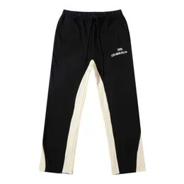 23FW Autumn Winter Europe German Patchwork Fleared Pants Byxor Bell-Bottoms Casual Drawstring Sweatpants Män kvinnor Jogger Slim Fit