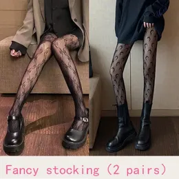 Skarpetki Hosiery 2 -częściowe czarne pończochy seksowne księżycowe puste koronkowe motyl fishnet moda ins Trendy 231110