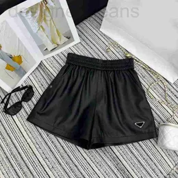 Shorts femininos designer 2023 inverno triângulo luxo designer mulheres couro preto para outono senhora casual cintura alta solta mini pqcj