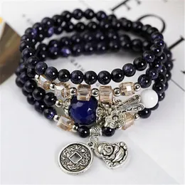 Strang natürliche blaue Sandsteinperlen mit Kupfer-Buddha-Münzen-Anhänger-Blumen-Spacer-Multi-Kreis-Armband Mode-Damenaccessoires