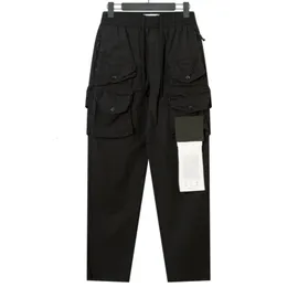 Męskie spodnie jesienne i zimowe Men's Stone Mark Multi Pocket Tool Fashion Casual Pants 230412