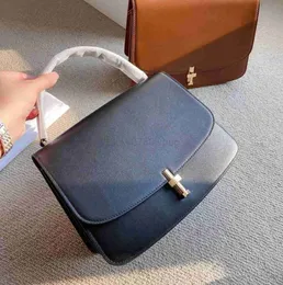 The row 2023 nova sofia bolsa moda versátil bolsa de couro tofu em forma de t botão órgão de alta qualidade