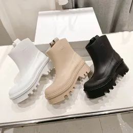 Vattentät TPU Raina Rain Boot Luxurys Designer Shoes Women Rubber Snow Rain Boots LUG SOLE Combat Style Da Pioggia Platform Water Rains Shoes Mid Calf Ankle Booties