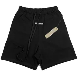 Designer shorts män och kvinnor casual shorts brev reflekterande broderi begränsade korta byxor