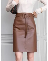 Kjolar äkta läderpennor kjolar kvinnor höst koreansk mode fast rak elegant midi kjol med bälte 230413