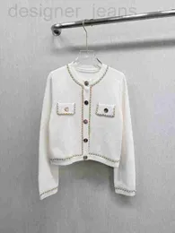 Kvinnors tröjor Designer Autumn and Winter New Balm Nanyou Gaoding Xiaoxiangfeng Fashion Metal Woven Chain Celebrity Short Sticke Cardigan Xk6y