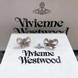 24SSデザイナーファッションViviene Westwoods Diamond Bowknot Saturn Earrings for Women's New Style Earringsジュニアハイエンドライトラグジュアリーイヤリング新しい2023