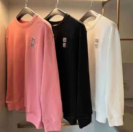 Kvinnors hoodies tröjor kvinnor hoodies designer rund nacke pullover tröja sping höst lösa män och kvinnor pärla sträng glittrande hoodie tröjor hxnp