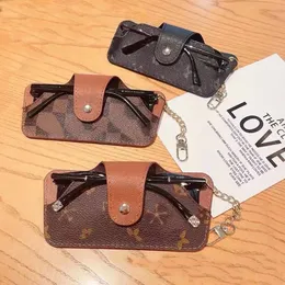 Designer Solglasögon Bag Fashion Glasses Bag Brand Men's and Women's Leather Keychain Solglasögon Cover