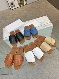 Topkwaliteit Casual schoenen nieuw voor zomer 2023 Cross Roman Slippers mode luxe damesontwerper flip flip letter katoenen stof sandalen strand flat schoenen