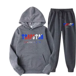 Tuta Trapstar Brand Printed Sportswear T-shirt da uomo 16 colori Warm Two Pieces Set Felpa con cappuccio allentata Pantaloni da jogging Design classico 61ess