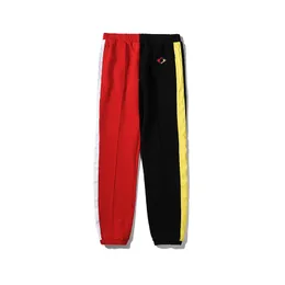 Pantalones sueltos de diseñador con cremallera, pantalones de chándal informales para hombre, ropa deportiva con cordón para correr.