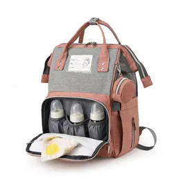 Torby na pieluchy szkoła torba Mommy Bag Solid Kolor Portable Multifunkcja z wózkiem do butelek mlecznych na opiekę urodzoną na świeżym powietrzu 231115