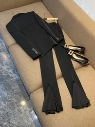 Conjuntos de pantalones de dos piezas de tul transparente negro de otoño Blazers con paneles y cuello de solapa de manga larga con pantalones acampanados Conjunto de pantalones Trajes de chaqueta de 2 piezas O3N022721