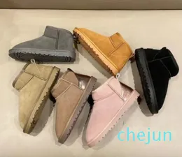 gli stivali da neve classici corti da minidonna mantengono gli stivali caldi casual in peluche da donna Scarpe in pelle scamosciata di pelle di pecora