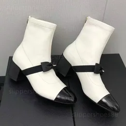 stivaletti firmati da donna stivaletti tacco in morbida pelle moda stivaletti moda stivaletti fiocco nodo nero bianco grosso stivali tacco basso tacchi gattino comode scarpe eleganti