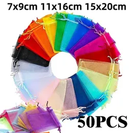 مربعات المجوهرات 50pcs Lot Multicolor Bagging Bag 7 9 11 16 15 حوالي 20 سم أكياس أورجانزا للأجنحة تخزين الأوباح الزفاف بأعمال الجملة 231117