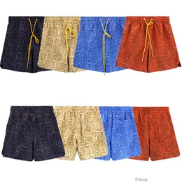 Projektant krótki mody swobodne odzież plażowe spodenki na plażę Rhude nerkowca Split Shorts Summer American High Street Trend swobodne luźne męskie spodnie na plażowe spodnie