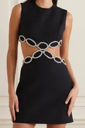 Sukienki zwykłe Rozdziela się Teger 2023 Summer Seksowne kobiety Seksowne Backless Wycięte diamentowe luksusowe czarne ciasne mini eleganckie imprezę klubową wieczorową 230419