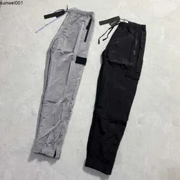 Men's Pants Brand Designers Pants Stone Metal Nylon Pocket Embroidered Badge Casual Trousers Thin Reflective Island Pants Size M-2xl W181