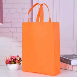 Nya färgglada vikningspåse som inte är vävda tyg fällbara shoppingväskor återanvändbara miljövänliga fällbara bages nyheter damer förvaring väskor lager grossist