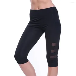 Pantalones cortos activos Poliéster transpirable y agradable para la piel Malla para correr Cintura alta con bolsillos laterales Pantalón de yoga para mujer Entrenamiento Control de barriga Gimnasio