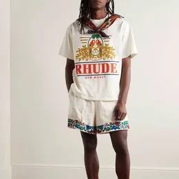 디자이너 패션 의류 티셔츠 힙합 티셔츠 Rhude American High Street 여름 다이아몬드 앵무새 꽃 슬로건 루스 티셔츠 남성 여성 로그인