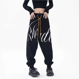 Designerkläder Fritidsbyxa RHUDE unisex high-end lätt lyxig bokstav jacquard löst sittande sport fritidsstickade leggings Streetwear Jogger Joggingbyxor Hiphop