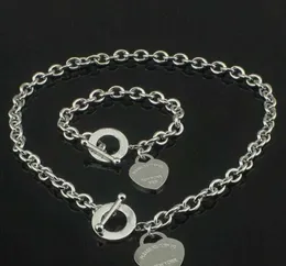 Collane con ciondolo Vendita calda Compleanno Regalo di Natale Set di braccialetti con collana d'amore in argento 925 Set di gioielli con dichiarazione di matrimonio Set di braccialetti a cuore 2 in 1 23ess Corrente di movimento