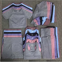 Womens tracksuits 가을 겨울 패션 체육관 착용 디자이너 조끼 요가 정장 스타일 Sportwear 피트니스 스포츠 5PCS 브래지어 티셔츠 레깅스 복장 솔리드 yogaworld 탄성