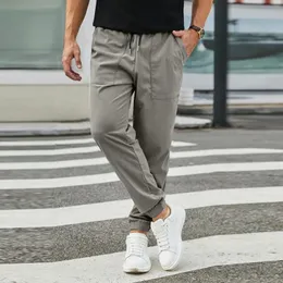 Spodnie męskie spodnie dresowe multi-pockets mężczyźni jesienne bawełniane męskie męskie swobodne spodni luźne sznurka prosta spodnie rozmiar duże pantelony