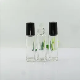 Botellas de rodillos de vidrio transparente de 1/3 oz Botellas de rodillos de aceite esencial de perfume de fragancia de vidrio vacías de 10 ml con bolas de rodillos de vidrio Tornillo negro Ca Wcas